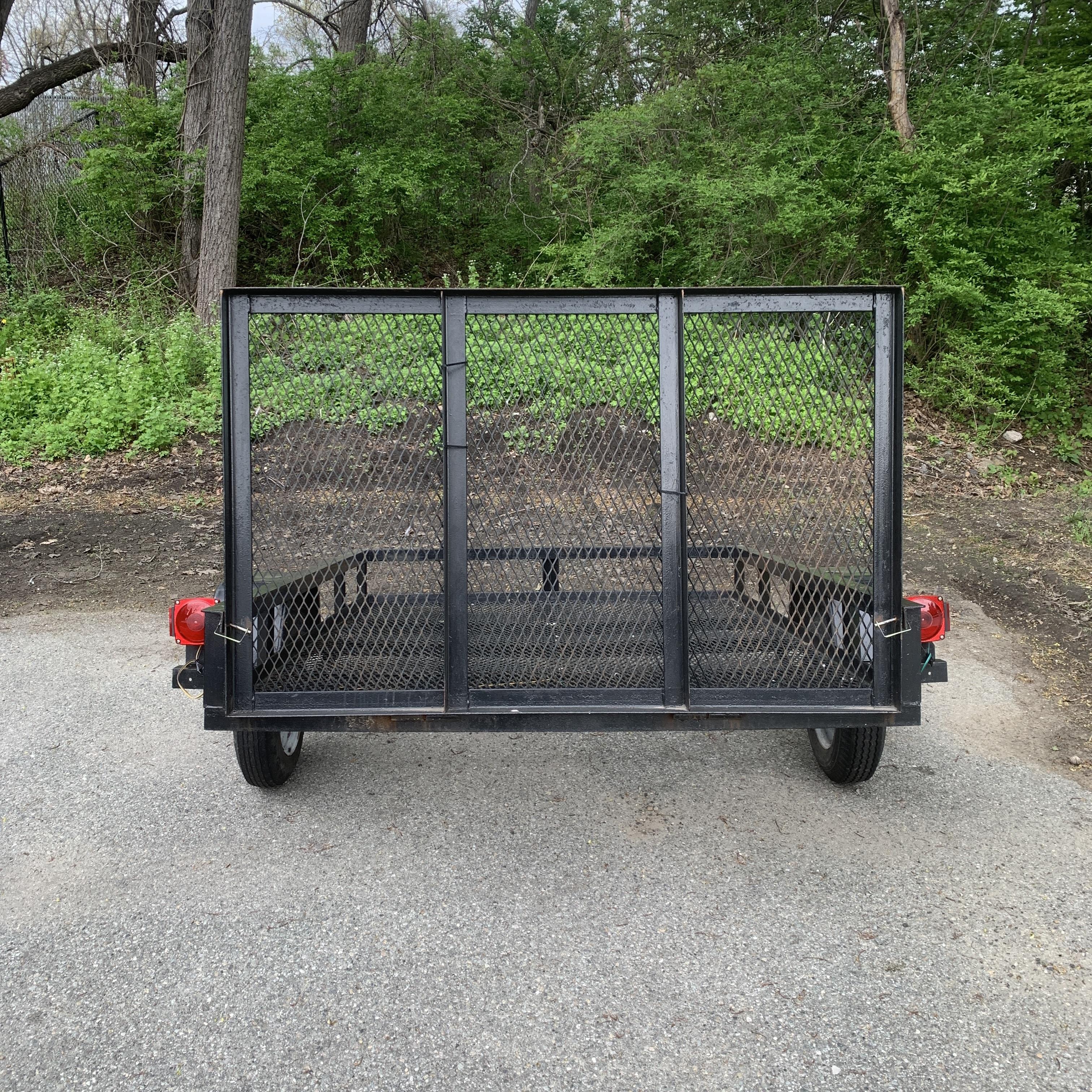 Carry-On Trailer 5-ft x 8-ft Steel mesh Utility Trailer with Ramp Gate ( 1625-lb Capacity ) With Hitch Included Rental