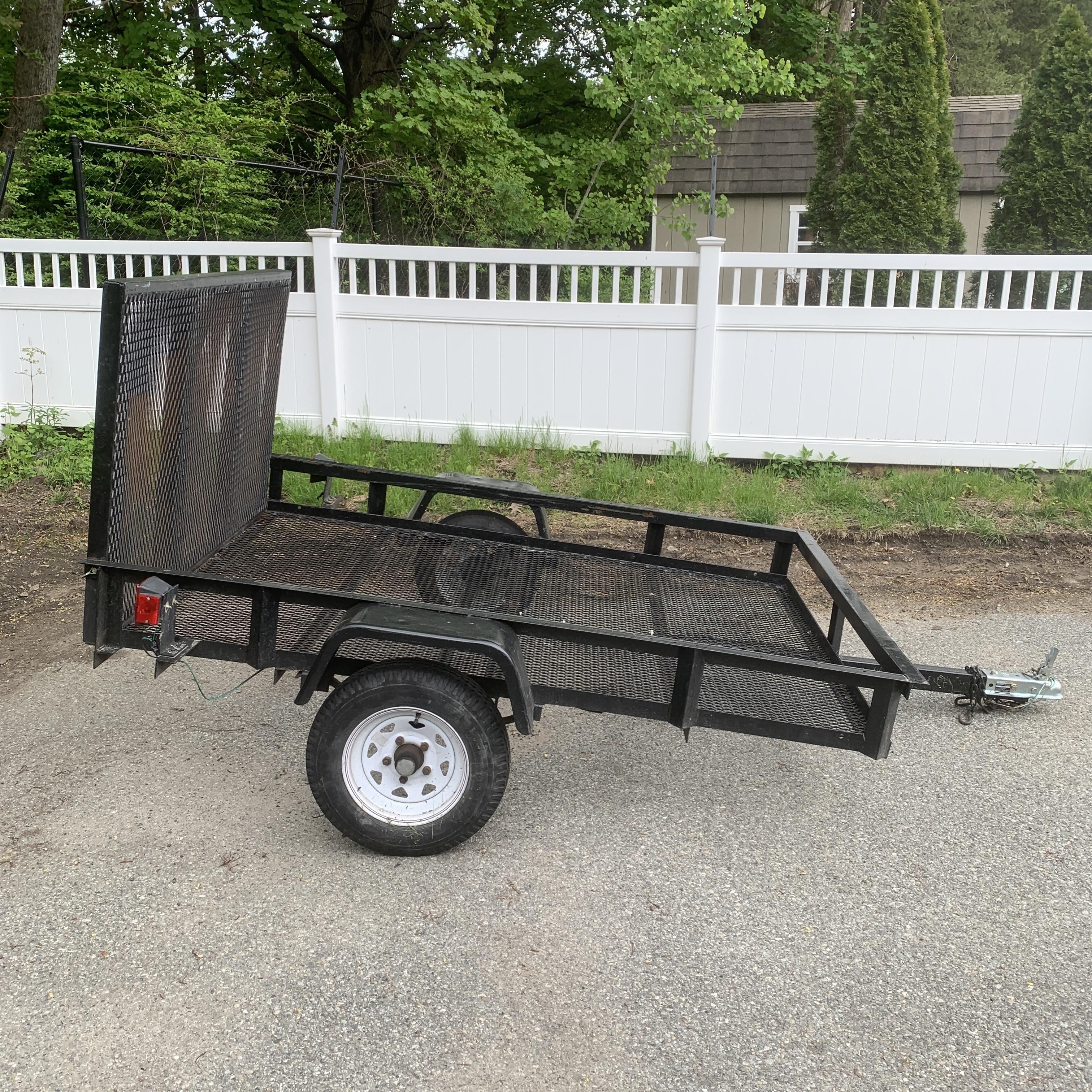 Carry-On Trailer 5-ft x 8-ft Steel mesh Utility Trailer with Ramp Gate ( 1625-lb Capacity ) With Hitch Included Rental